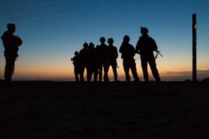 soldiers at dusk
