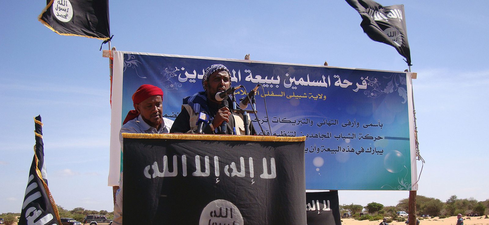 Al-Shabaab – man giving speech at podium