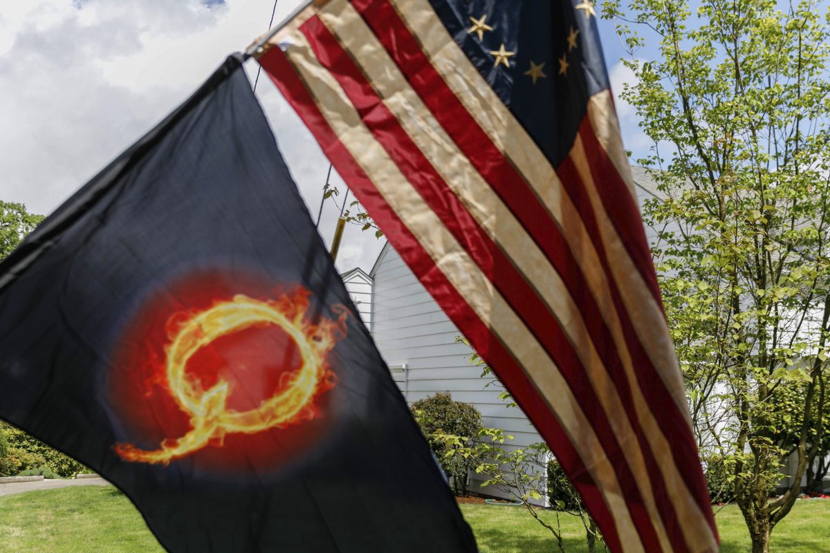 The QAnon Conspiracy Theory: A Security Threat in the Making